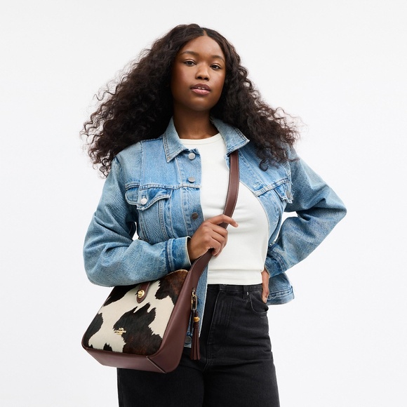 Hadley Convertible Crossbody Bag With Cow Print And Tassel - Picture 5 of 10